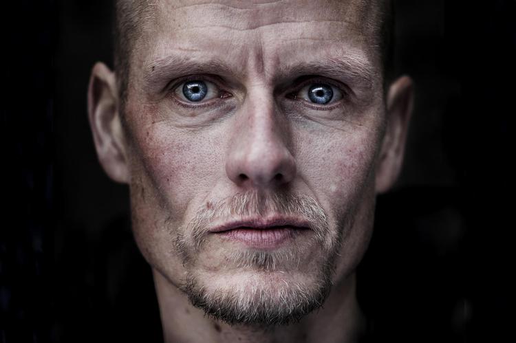 Cykelrytteren Michael Rasmussen var en typisk bjergrytter med lav fedtprocent og en veludviklet muskelmasse. Arkivfoto af cykelrytter Michael Rasmussen  Simon Fals