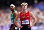 Simon Hansen fik et chok, da han kiggede op på storskærmen på Stade de France og så sin tid efter de 100 meter. Foto: Alina Smutko/Ritzau Scanpix