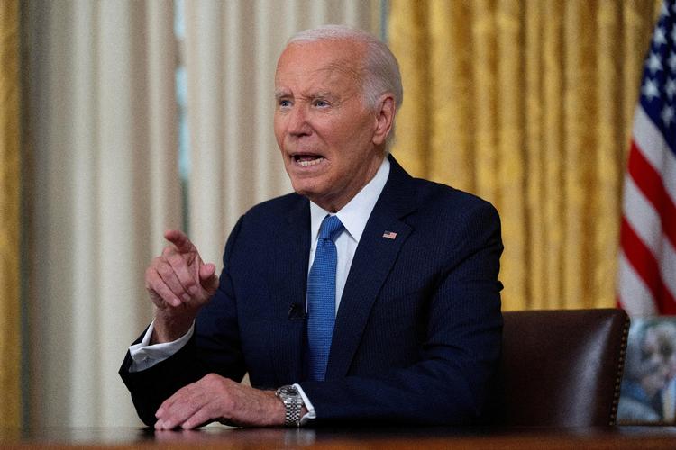 Joe Biden i det ovale værelse i Det Hvide Hus, da han fortalte amerikanerne om sin beslutning om at trække sig fra præsidentvalget.
 Foto: Evan Vucci/Ritzau Scanpix