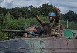 Ukrainske soldater på et infanterikampkøretøj i Sumy lige syd for grænsen til Rusland. Foto: Viacheslav Ratynskyi/Ritzau Scanpix