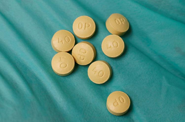 Sundhedsforsikringsselskaber og pensionsselskaber mener, at tre lægemiddelgrossister har været med til at drive opioidkrisen i USA. Foto: George Frey/Ritzau Scanpix