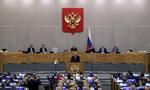 Ministerpræsident Mikhail Misjustin fotograferet på talerstolen i Dumaen, underhuset i det russiske parlament i Moskva. Foto: Evgenia Novozhenina/Ritzau Scanpix