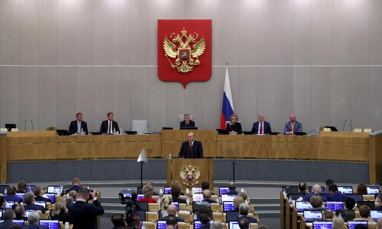 Ministerpræsident Mikhail Misjustin fotograferet på talerstolen i Dumaen, underhuset i det russiske parlament i Moskva. Foto: Evgenia Novozhenina/Ritzau Scanpix