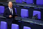 Den tyske kansler, Olaf Scholz, tog den glade mine på, da han onsdag talte til Forbundsdagen og erklærede sig klar til nyvalg i februar Foto: Lisi Niesner/Ritzau Scanpix