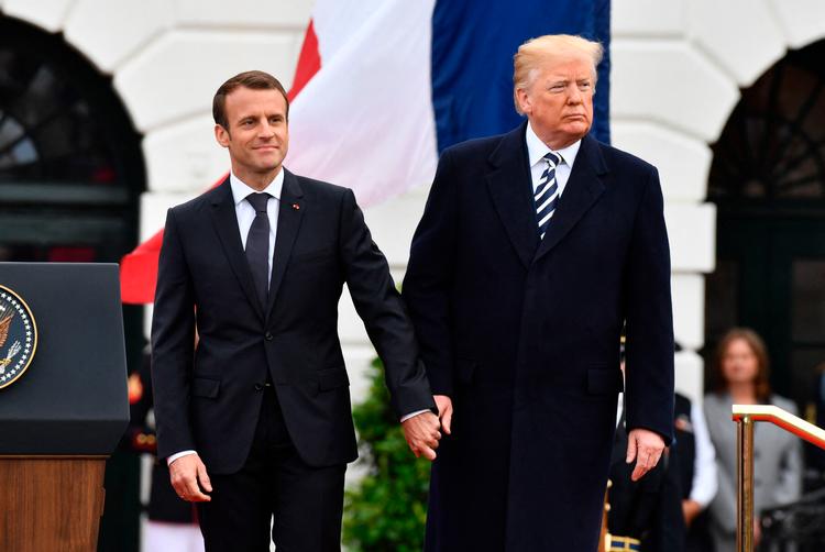 Den franske præsident, Emmanuel Macron, imponerede USA's daværende og kommende præsident, Donald Trump, da denne besøgte Paris i 2017. Året efter besøgte Macron USA (billedet). Foto: Nicholas Kamm/Ritzau Scanpix