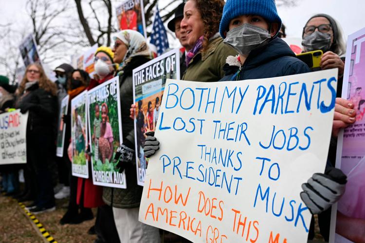 Demonstranter protesterer mod Trump i Washington. Foto: Jim Watson/Ritzau Scanpix