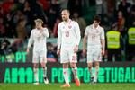 Christian Eriksen og Christian Nørgaard blev skiftet ud kort inden Portugals 3-2-scoring, der sendte kampen i forlænget spilletid. Foto: Bo Amstrup/Ritzau Scanpix