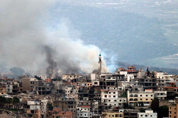 Israel udførte tidligere fredag en række luftangreb i den sydlige del af Libanon  som her i byen Khiam. Foto: Rabih Daher/Ritzau Scanpix