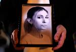 Den kendte ukrainske journalist Viktorija Rosjtjyna var ikke til at genkende, da hendes lig i februar kom til Ukraine. Hun blev 27 år.  Foto: Anatolii Stepanov/Ritzau Scanpix