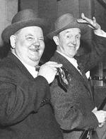 Stan Laurel (til højre), og Oliver Hardy i 1952. Graham Greene satte dem højere end Chaplin, mens Samuel Beckett pegede på dem som forbilleder for sin klassiker ’Vi venter på Godot’. Foto: AP/Ritzau Scanpix