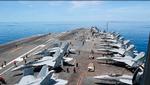 Hangarskibet 'USS Nimitz' har sat kurs mod Mellemøsten, men USA fastholder, at amerikanske styrker i regionen forbliver i det, de kalder en defensiv position. Foto: Edward Jacome/Ritzau Scanpix