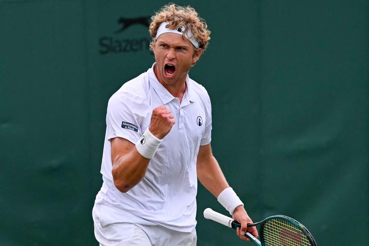 August Holmgren har overrasket alt og alle med sine sejre i Wimbledon. Lørdag hedder modstanderen Alex de Minaur. 
 Foto: Glyn Kirk/Ritzau Scanpix