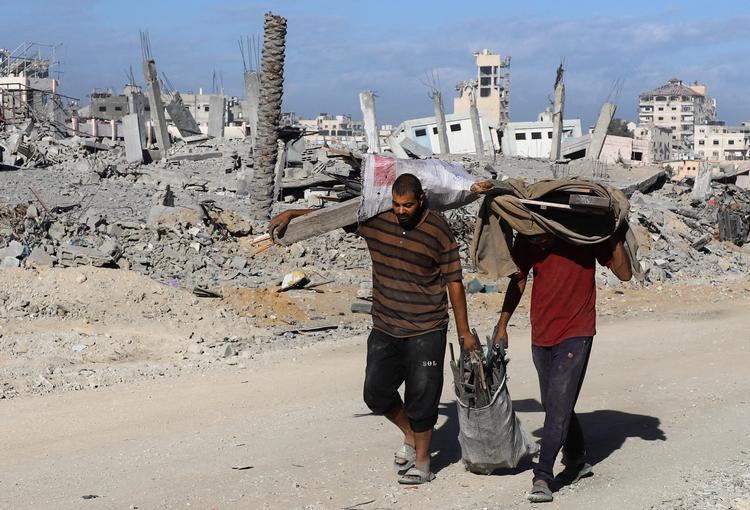 Indbyggerne i Gaza By er vendt hjem, langt de fleste til en ruinhob.  Foto: Ebrahim Hajjaj/Ritzau Scanpix