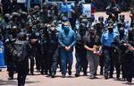 I 2022 blev Honduras' tidligere præsident Juán Orlando Hernández udleveret til USA efter anklager om narkosmugling. Nu har han fået sin frihed tilbage efter at være blevet benådet af præsident Trump.  Foto: Stringer/Ritzau Scanpix