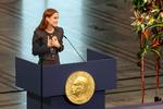 María Corina Machados datter, Ana Corina Sosa Machado, på  talerstolen ved uddelingen af Nobels fredspris i Oslo i dag.  Foto: Leonhard Foeger/Ritzau Scanpix