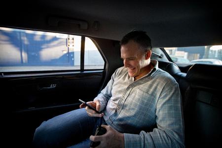 Here, Rufus Gifford is seen in the backseat of his black Cadillac – as if it had rolled straight out of an American film – while he represented U.S. interests in Denmark. Foto: Finn Frandsen/Ritzau Scanpix
