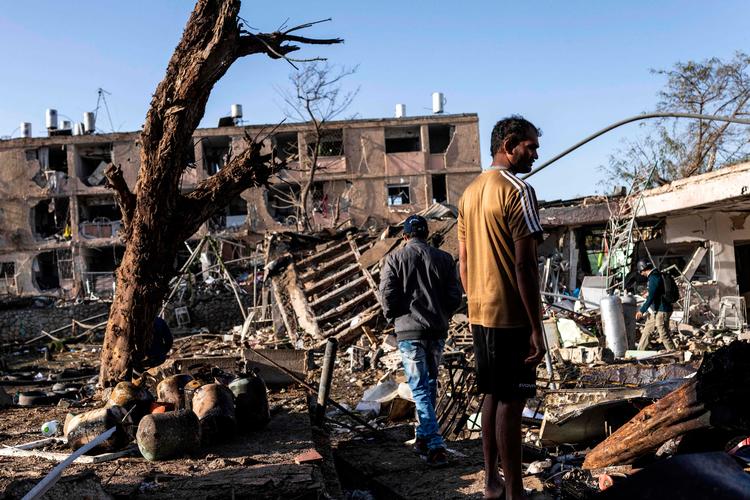 Ruiner i byen Dimona efter Irans seneste missilangreb på Israel. Hidtil har Irans missilsystem været fokuseret på præcision og mål i nærområdet. Men et nyt angreb indikerer, at Irans missiller muligvis har langt større rækkevidde.  Foto: John Wessels/Ritzau Scanpix