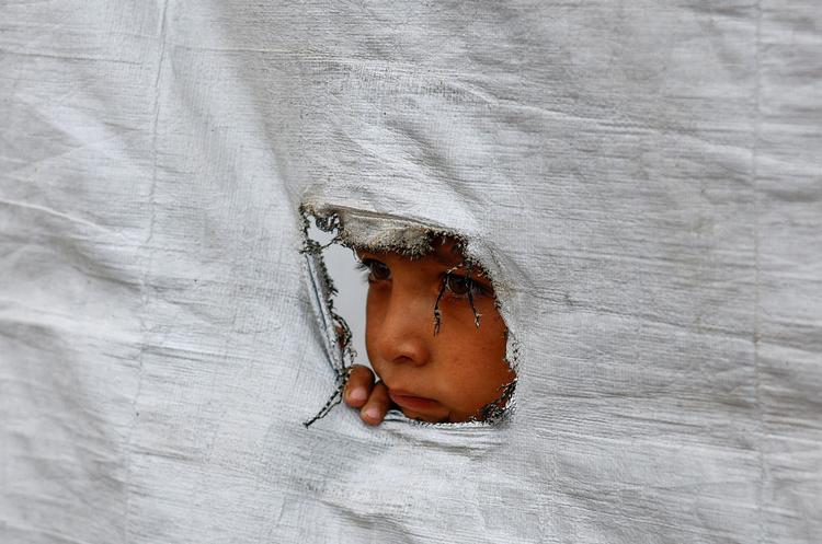 Cirka 1,8 millioner palæstinensere i Gaza lever som internt fordrevne i Gaza og må bo  i telte og flygtningelejre, mens de venter på at kunne flytte hjem til deres kvarterer, der for store deles vedkommende er ødelagt.  Foto: Mahmoud Issa/Ritzau Scanpix