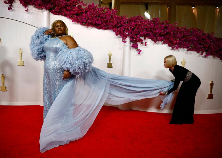 Da'Vine Joy Randolph strålede i sit Louis Vuitton-skrud, da hun i 2024 modtog en Oscar.  Udover at være skuespiller er hun også sanger. Filmen 'Dolemite Is My Name' er blandt dem, hvor man kan høre, hvor godt hun synger.  Foto: Sarah Meyssonnier/Ritzau Scanpix