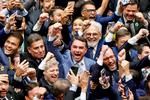 Senator Flavio Bolsonaro, der er søn af Brasiliens tidligere præsident Jair Bolsonaro, besøgte for nylig USA's præsident, Donald Trump. Kort efter har USA nu udpeget to brasilianske bander som terrororganisationer. Foto: Sergio Lima/Ritzau Scanpix