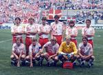  Danmark spillede sin første VM-kamp nogensinde mod Skotland i 1986. Holdet var bagerst fra venstre Frank Arnesen, Søren Busk, Michael Laudrup, Ivan Nielsen, Jesper Olsen og Jens Jørn Bertelsen. Forrest fra venstre Klaus Berggren, Morten Olsen, Søren Lerby, Troels Rasmussen og Preben Elkjær. Foto: Finn Frandsen/Ritzau Scanpix