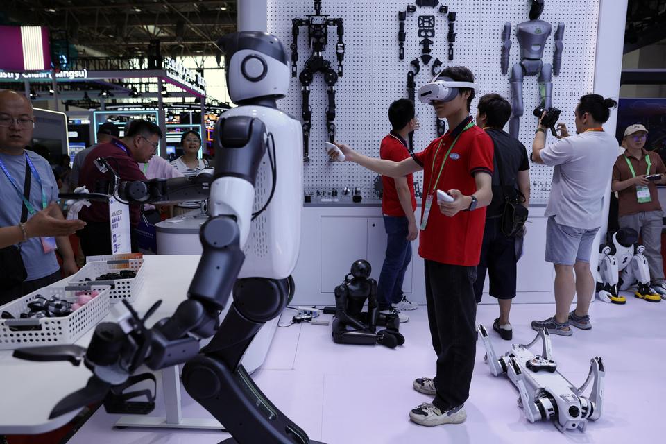 Robotter, robotter, robotter ... Kina har sat kul på udviklingen af kunstigt intelligente robotter, der måske kan være med til at redde velfærdsstaten.  Foto: Florence Lo/Ritzau Scanpix