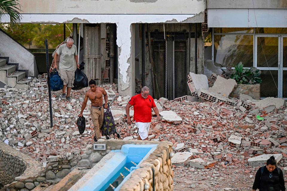To voldsomme jordskælv har lammet Venezuela, dræbt mindst 164 personer og ødelagt adskillige bygninger. Mange er fortsat savnet. Foto: Federico Parra/Ritzau Scanpix