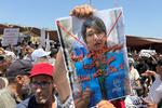 Mens EU har øget kontrollen med sine grænser, vokser fjendskabet over for migranter i migrantknudepunktet Libyen.  I begyndelsen af juni krævede demonstranter i Tripoli FN's flygtningeorganisation UNHCR smidt ud.  Foto: Ayman Al-sahili/Ritzau Scanpix