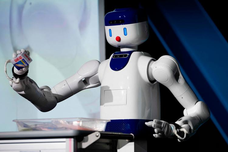 Japan oplever et faldende befolkningstal og er langt fremme med udvikling af robotter, som kan erstatte menneskelig arbejdskraft. Robotten her er fotograferet på en udstilling i Tokyo i begyndelsen af august.  Foto: Andrew Caballero-reynolds/Ritzau Scanpix