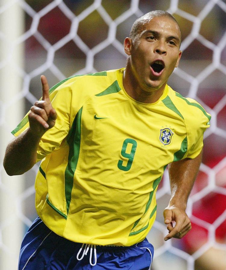   Med højre pegefinger hævet og munden formet som et stort O. Sådan fejrede Ronaldo de fleste af sine mål. Og det var mange. Foto: Jerry Lampen/Ritzau Scanpix
