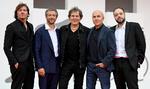 Filmen er instrueret af italieneren Francesco Carrozzini (nummer to fra venstre) og rekonstruerer blandt andet dele af Diesel-grundlæggeren Renzo Rossos barndom ved brug af kunstig intelligens. Foto: Ettore Ferrari/Ritzau Scanpix