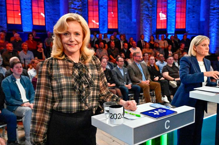 Centerpartiets leder Elisabeth Thand Ringqvist har gjort sine ternede skjorter til sit varemærke under sine mange optrædener i den svenske valgkamp. Foto: Anders Wiklund/Ritzau Scanpix