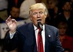 FILE - In this Thursday, Dec. 1, 2016 file photo, U.S. President-elect Donald Trump speaks during a "USA Thank You" tour event in Cincinnati. An official Chinese newspaper Tuesday, Dec. 12, 2016, called Donald Trump "as ignorant as a child" on Monday after the president-elect again suggested that he was reconsidering how America deals with Taiwan, one of the most sensitive issues in the relationship between the U.S. and China. (AP Photo/Evan Vucci, File) 