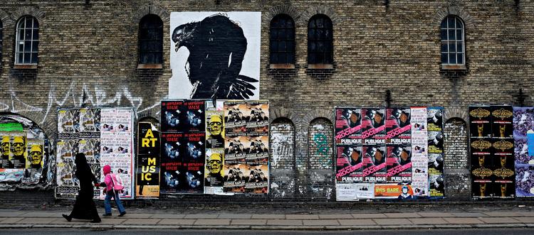 Loppebygningen er en lang afvisende mur ud mod Prinsessegade. Den kan få genåbnet flere af de gamle vognporte, hvis en ny aftale med Københavns Kommune får støtte af Borgerrepræsentationen. 