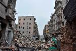 »DK bør tage 1500 kvoteflygtninge. Det ville være et fint signal at sende i denne tid, hvor civile fra Aleppo er på flugt fra bomber og henrettelser«, skriver Pia Olsen Dyhr. Aleppo, 13. december 2016. Foto: George Ourfalian (AFP foto)  