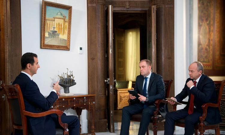 Syriens præsident Bashar al-Assad interviewes af russiske TV-kanaler i Damaskus i Syrien. (SANA via AP) 