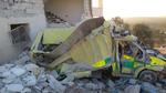 Billedet er fra november i år, hvor en ambulance, der var på vej ud til fire sårede kvinder i Idlib, blev destrueret af massive luftangreb. 