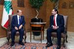 Libanons præsident, Michel Aoun, sammen med landets nye regeringschef, Saad Hariri, i præsidentpaladset  Baabda i det østlige Beirut.  