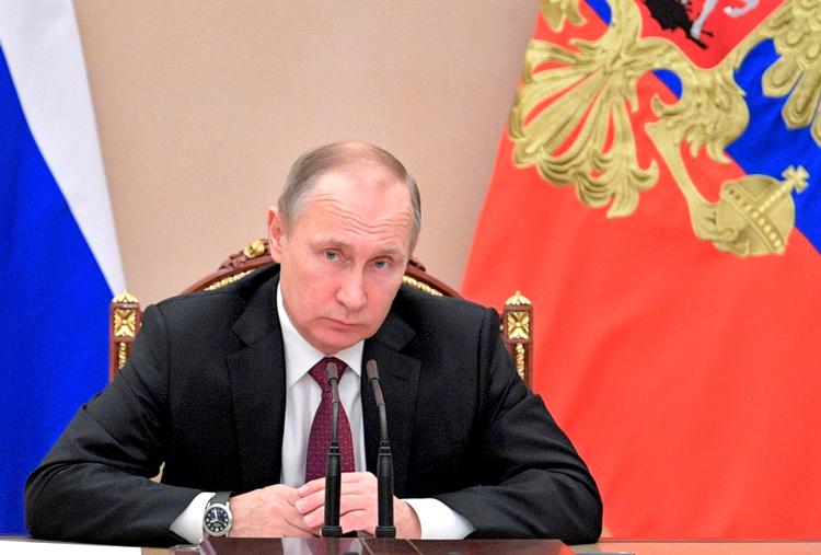 Præsident Vladimir Putin under et regeringsmøde onsdag. Han har ikke selv kommenteret den nye rapport, men hans talsmand kalder den 'en total and'. 