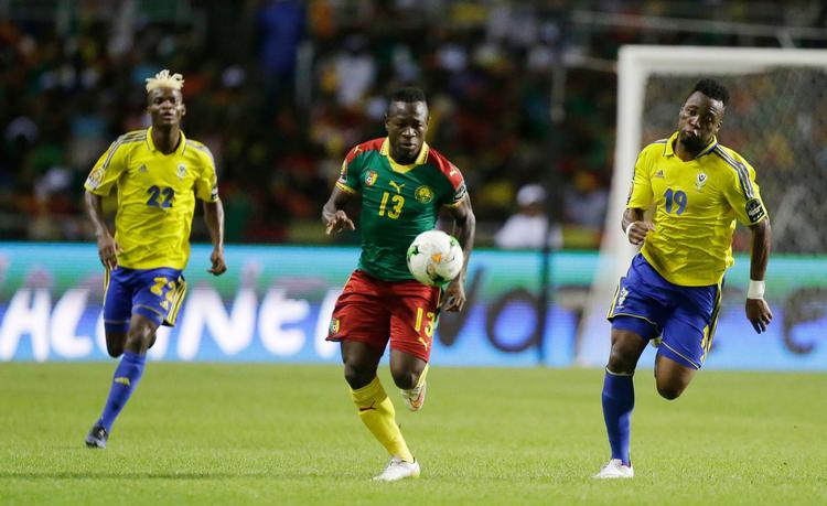 Kampen om det afrikanske mesterskab fortsætter for Christian Bassogog (i midten) efter 0-0 mod værtsnationen Gabon. 