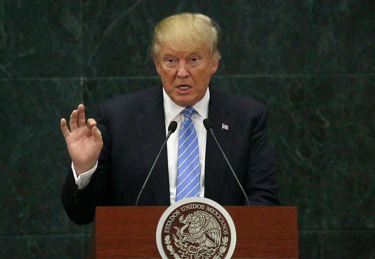 USA's præsident, Donald Trump, vil kæmpe for at få gennemført sit indrejseforbud. 