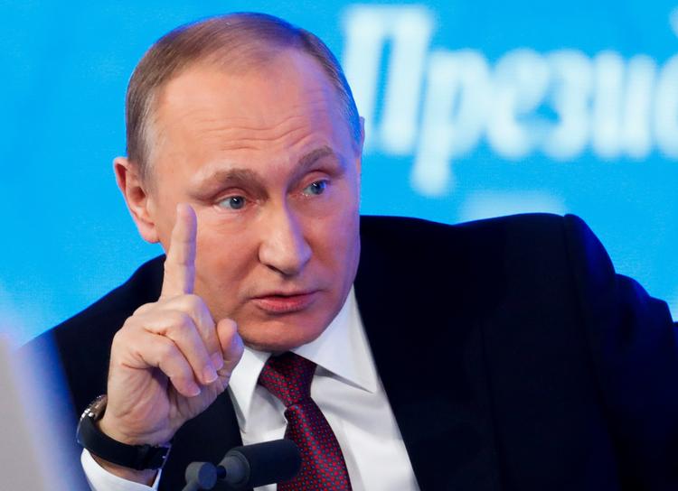 Præsident Vladimir Putin på sit årlige storpressemøde i Moskva i december.
 