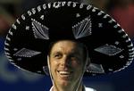Det brede smil blev luftet, da Sam Querrey fejrede sin triumf i Acapulco, hvor han besejrede en af spillets største stjerner, Rafael Nadal.  