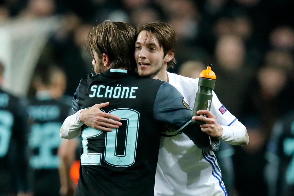 Europa League 1/8-finale i Parken: FCK - Ajax. Ajaxs Lasse Schöne og FCKs Rasmus Falk efter kampen. 