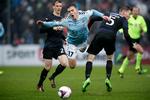  Randers FCs Kasper Enghardt og Mads Agesen i færd med at fælde Sønderjyskes Mikael Uhre. 