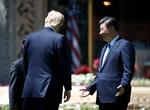 Præsidenterne Donald Trump and Xi Jinping under deres møde i Florida i sidstse uge. 