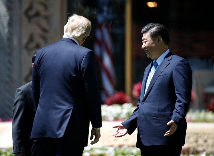 Præsidenterne Donald Trump and Xi Jinping under deres møde i Florida i sidstse uge. 