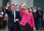Den nyvalgte franske præsident, Emmanuel Macron og den tyske kansler Angela Merkel. 