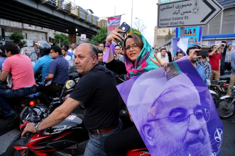 Tilhængere af Rouhani var i den forgangne uge massivt til stede på gaderne i Teheran, for at støtte op om præsidentens genvalg. 
