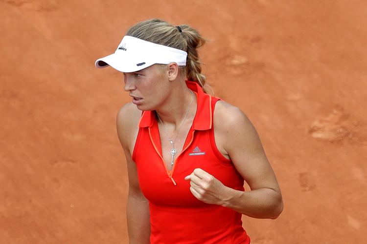 Caroline Wozniacki viste fin grusform i opgøret mod ung canadier. 